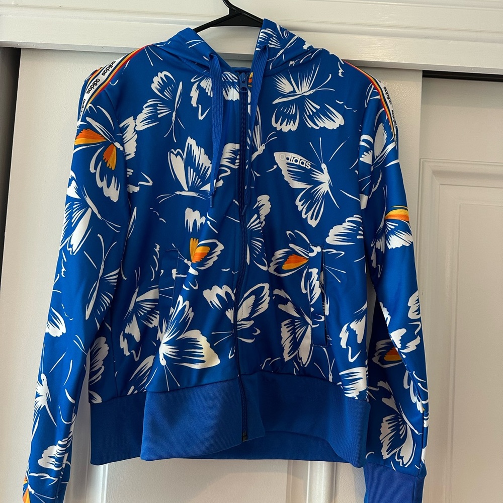ADIDAS FARM RIO ALL OVER PRINT ZIP UP HOODED SWEATSHIRT